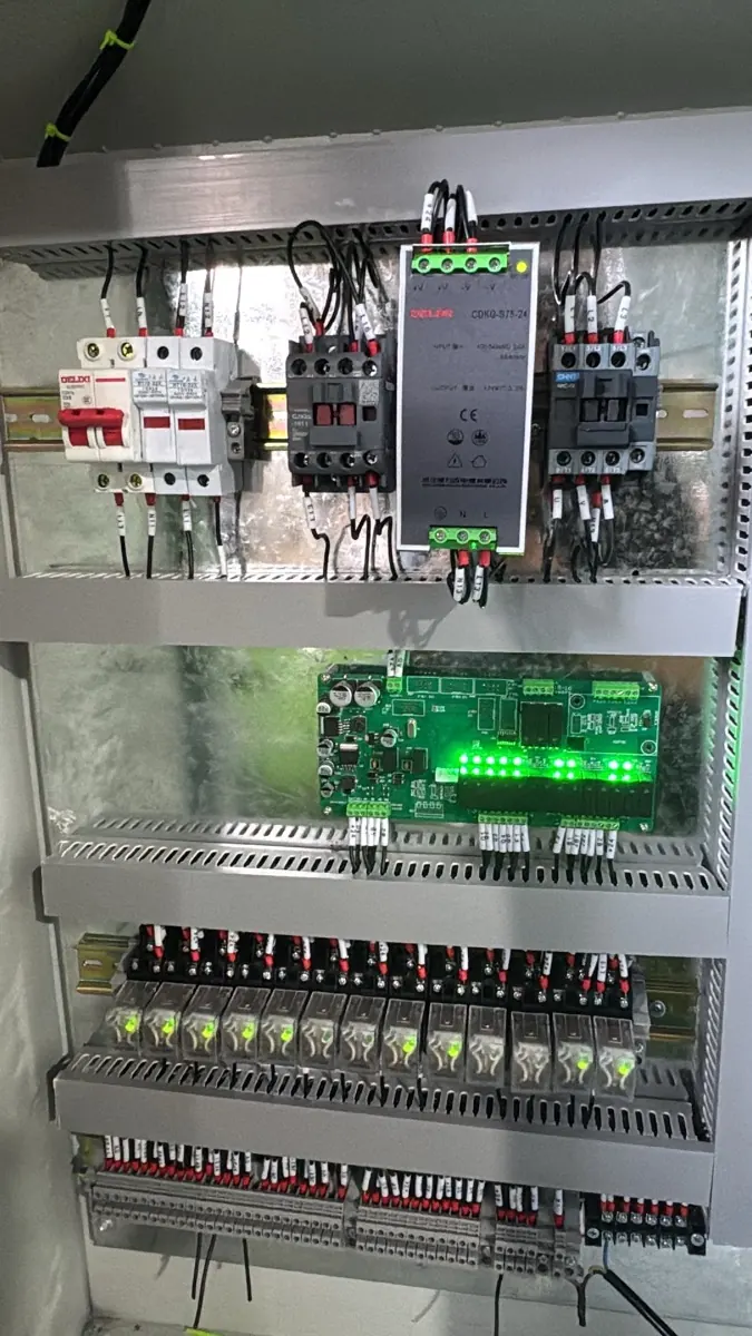 Interior of pkydrip climate electrical control cabinet with contactors, relays and labeled wiring